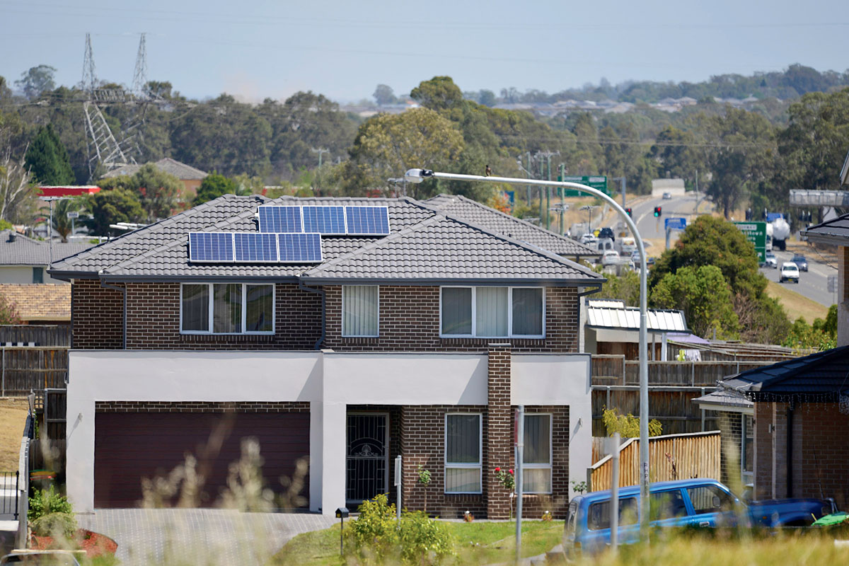 Solar panel roof in residential area in Glenfield, South West Sydney, NSW. Credit: NSW Department of Planning and Environment / Adam Hollingworth