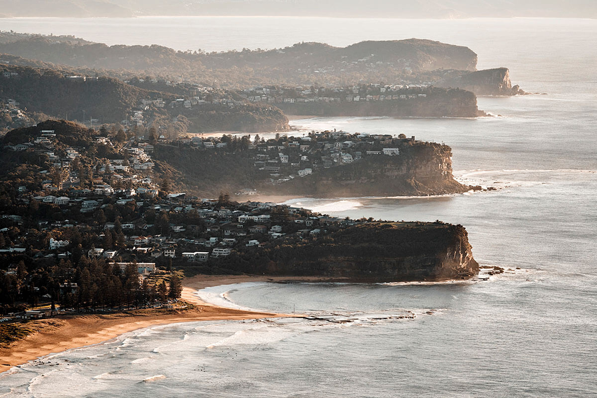Scenic views looking north from Mona Vale Beach in Sydney's Northern Beaches. Credit: Destination NSW