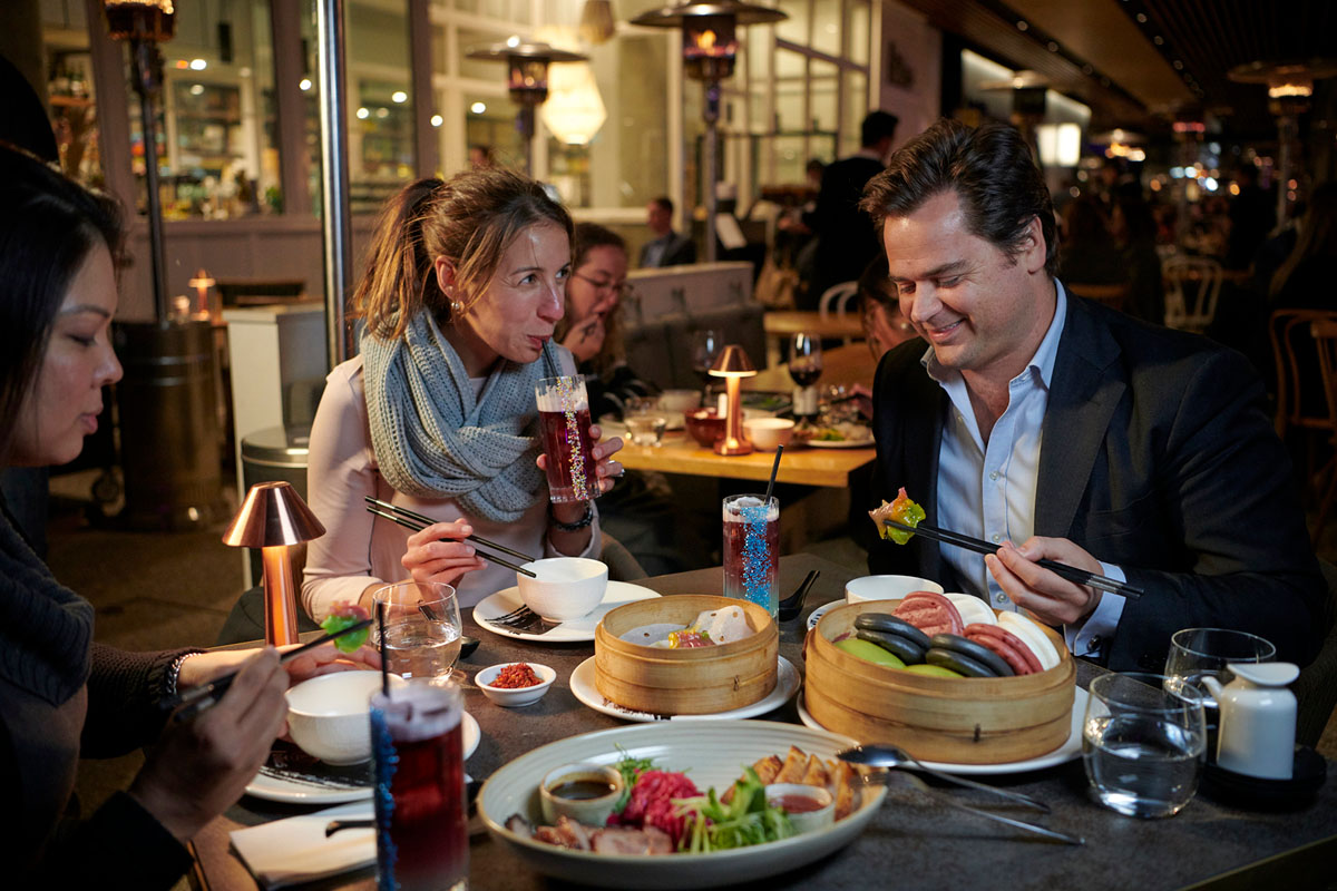Diners feasting on the Vivid inspired menu options at Lotus Barangaroo during Vivid Sydney 2019. Credit: Destination NSW