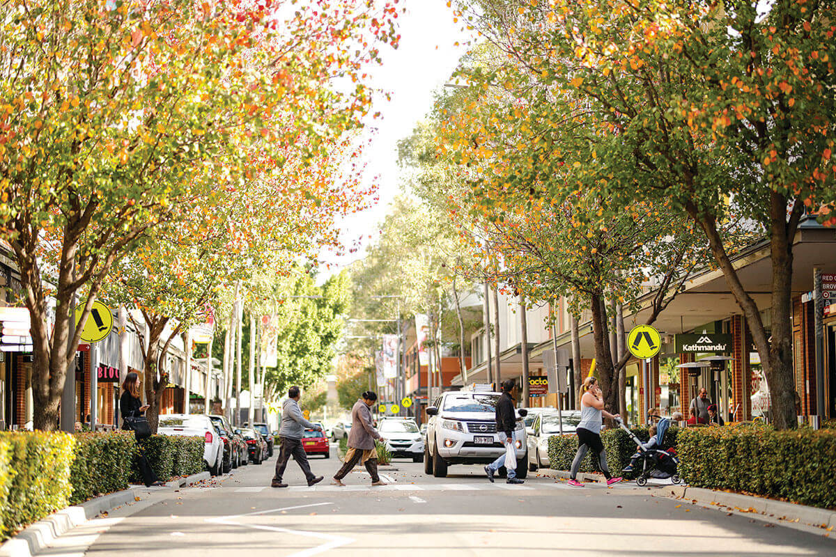 People crossing the street at Rouse Hill Town Centre, Rouse Hill NSW. Credit: NSW Department of Planning, Housing and Infrastructure / Salty Dingo